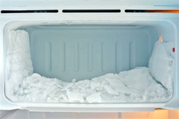 Can you lay down a freezer for transport?