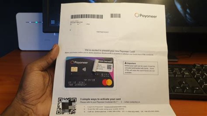 How can I top up my Payoneer card?