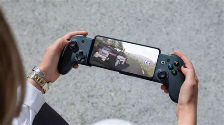 How can I use my phone as a gamepad for Android TV?