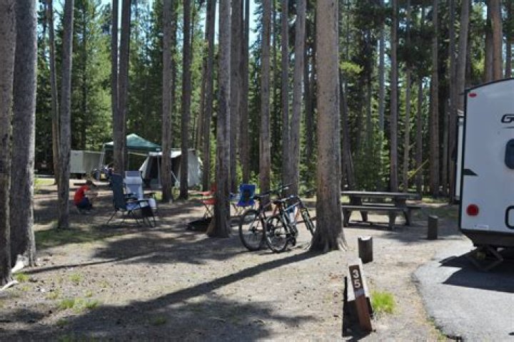 How do I book Grant Village Campground?
