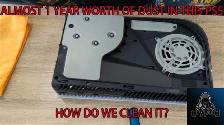 How do I clean the dust out of my Wii?