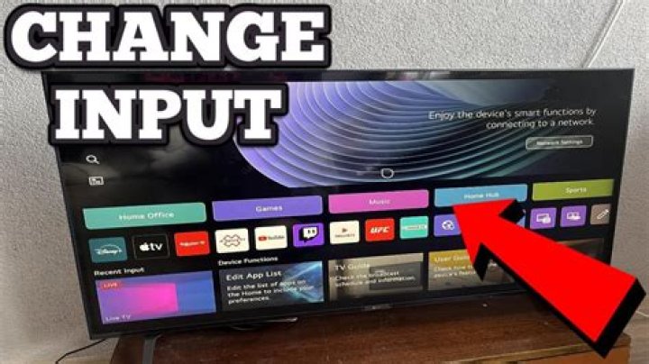 How do you change the input on a TCL TV?