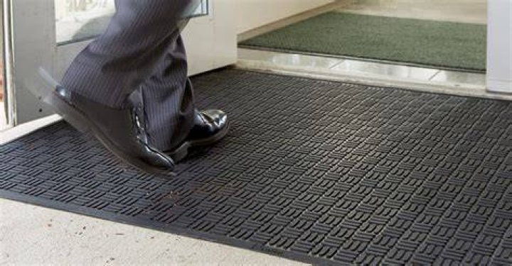 How do you clean floor mats?