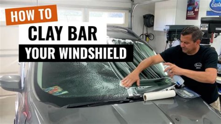 How do you use a clay bar on a windshield?