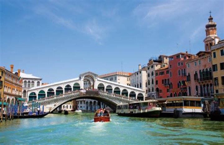 How many canals and bridges are there in Venice?
