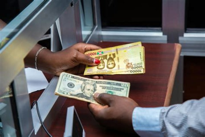 How many Dineros is a dollar?