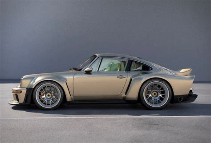 How much did a Porsche 911 cost in 1984?
