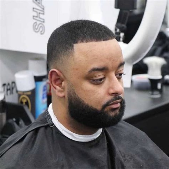 How much is a haircut at Floyd's 99 Barbershop?