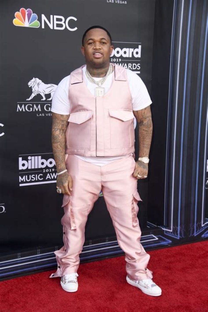 How old is DJ Mustard?