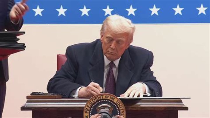 What can the president do to a bill when signing it?