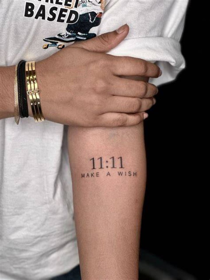 What does the tattoo 11 11 mean?