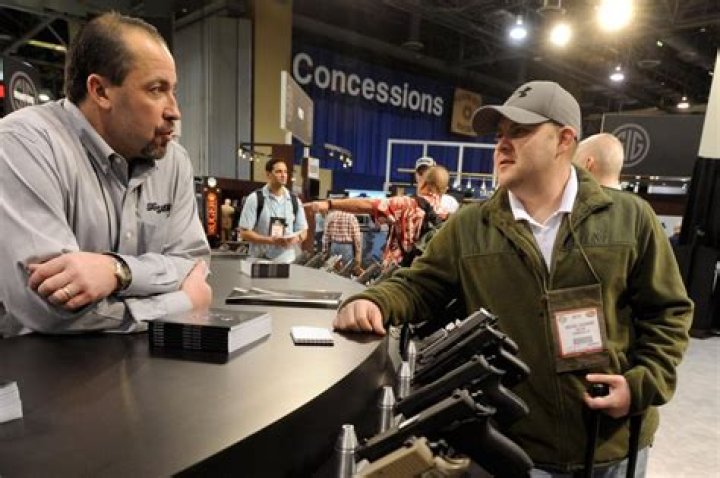 What is the gun show loophole discussed in the documentary?