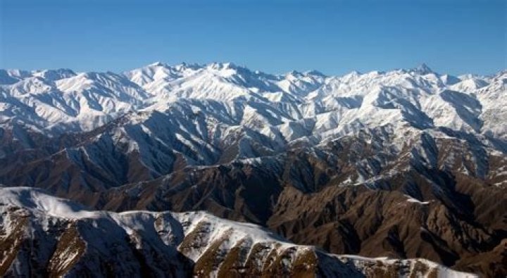 What is the name of the mountain range mostly in northeast Afghanistan?