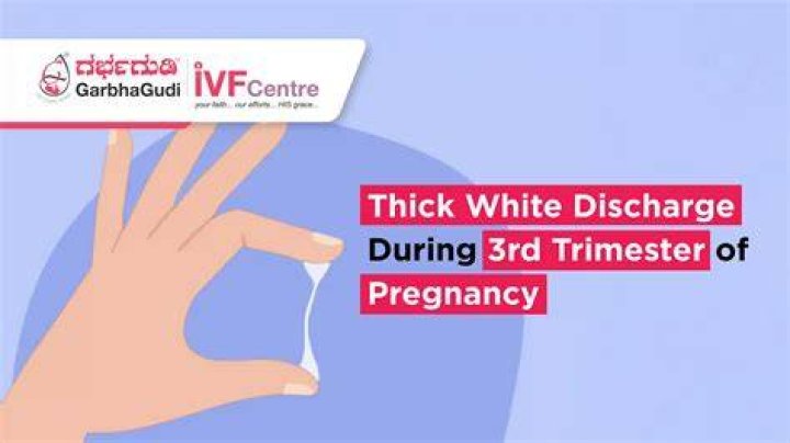 What STD causes a thick white discharge?