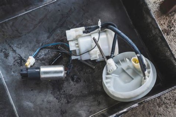 Where is the fuel pump located on a 1995 Toyota Camry?