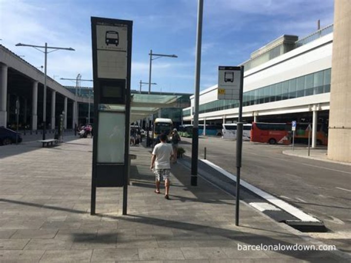 Where is the MonBus stop at Barcelona airport?