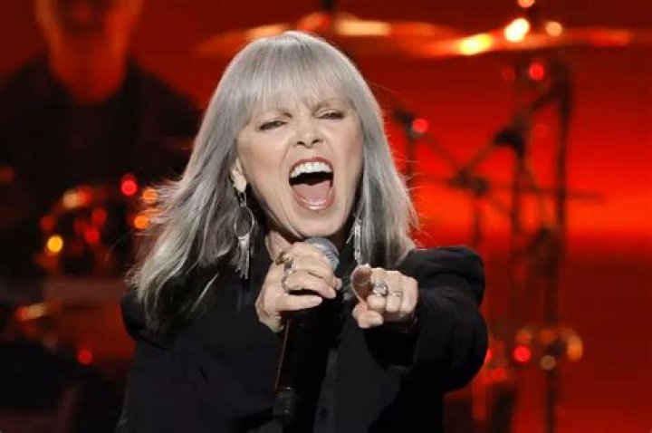 Who wrote Pat Benatar's songs?
