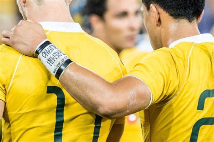 Why do football players wear tape?