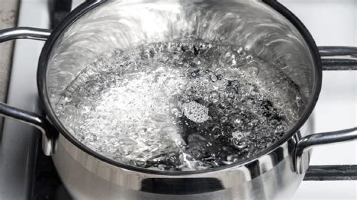 Why is it more efficient to boil water in a kettle than a saucepan?