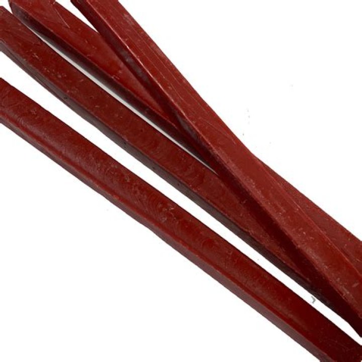 Will sealing wax stick to glass?